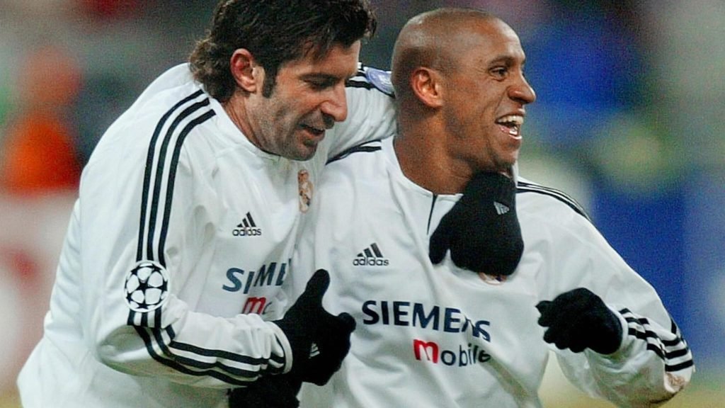 Roberto Carlos y Luis Figo